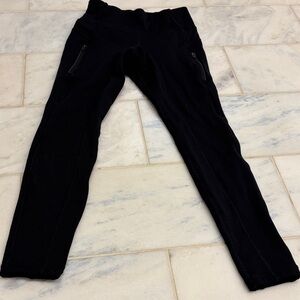 Athleta fleece lined Black Leggings with Zipper Pockets. Like new condition.